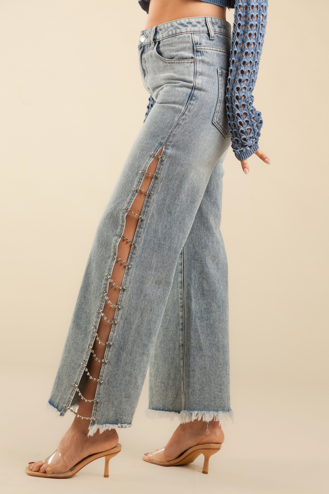 Denim jeans with rhinestones on side